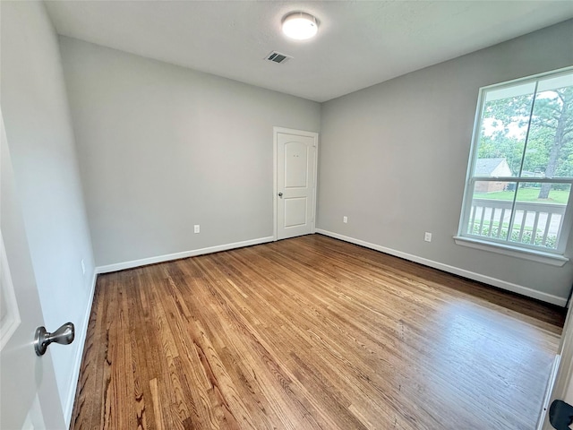 11418 Braewick Dr, Houston, TX 77035 - spare room featuring wood finished floors and baseboards