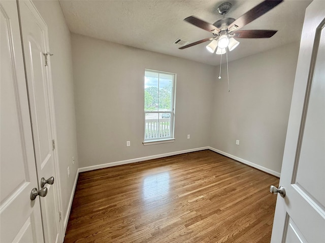 11418 Braewick Dr, Houston, TX 77035 - unfurnished room featuring wood finished floors and ceiling fan