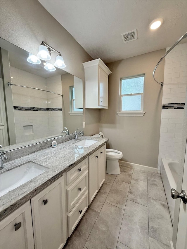 11418 Braewick Dr, Houston, TX 77035 - bathroom featuring double vanity, washtub / shower combination, and tile patterned floors