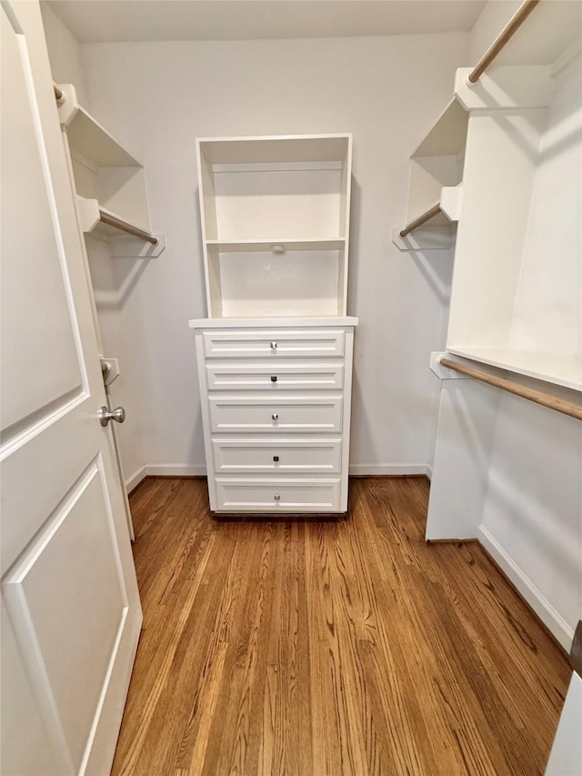 11418 Braewick Dr, Houston, TX 77035 - spacious closet with wood finished floors