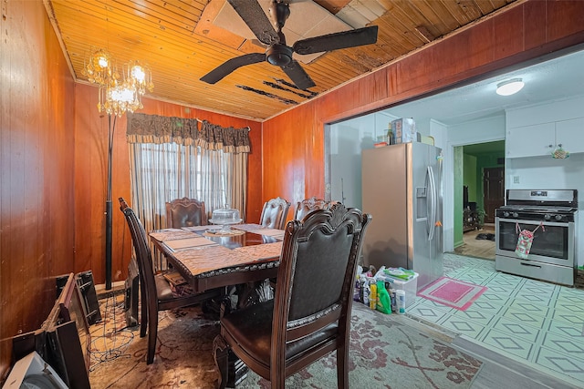 6741 Goforth St, Houston, TX 77021 - dining room featuring wooden ceiling, wooden walls, and ceiling fan