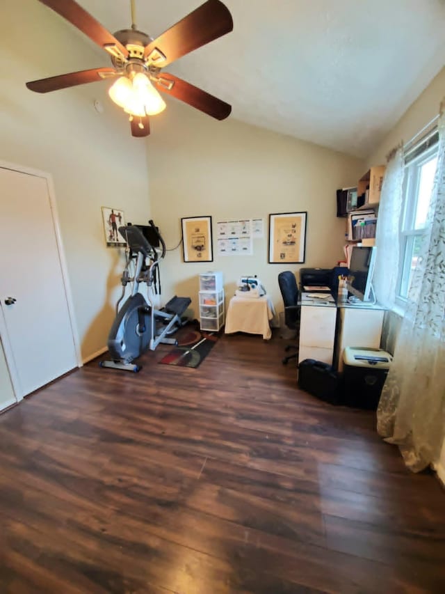 8728 Wilcrest Dr Unit 8728, Houston, TX 77099 - workout area with wood finished floors, vaulted ceiling, and a ceiling fan