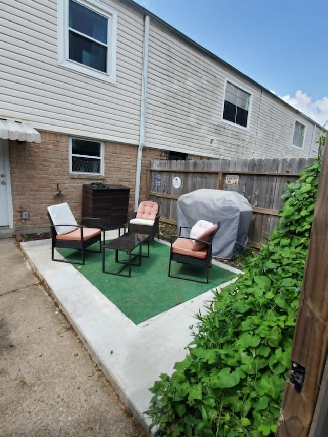 8728 Wilcrest Dr Unit 8728, Houston, TX 77099 - view of patio featuring area for grilling
