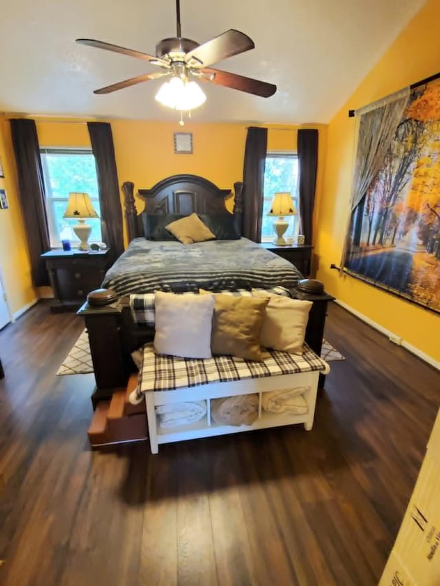 8728 Wilcrest Dr Unit 8728, Houston, TX 77099 - bedroom with wood finished floors, a ceiling fan, and vaulted ceiling