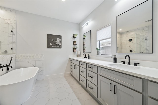 1810 Nauts Ct, Houston, TX 77008 - bathroom featuring a stall shower, double vanity, a freestanding tub, tile walls, and tile patterned flooring