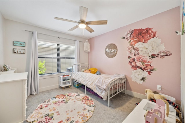 1810 Nauts Ct, Houston, TX 77008 - carpeted bedroom with baseboards and a ceiling fan