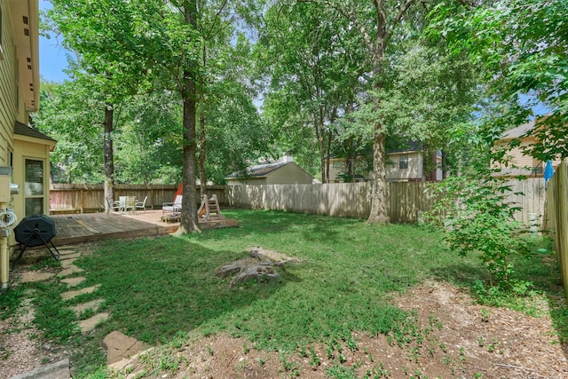100 W Rainbow Ridge Cir, The Woodlands, TX 77381 - fenced backyard with a deck