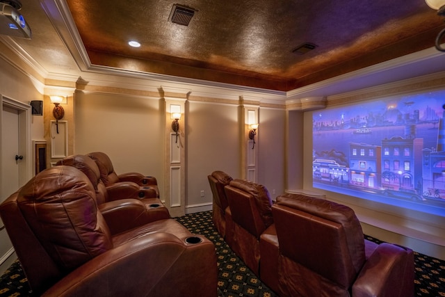 102 Lake Sterling Gate Dr, Spring, TX 77379 - carpeted cinema room with a tray ceiling, ornate columns, and ornamental molding