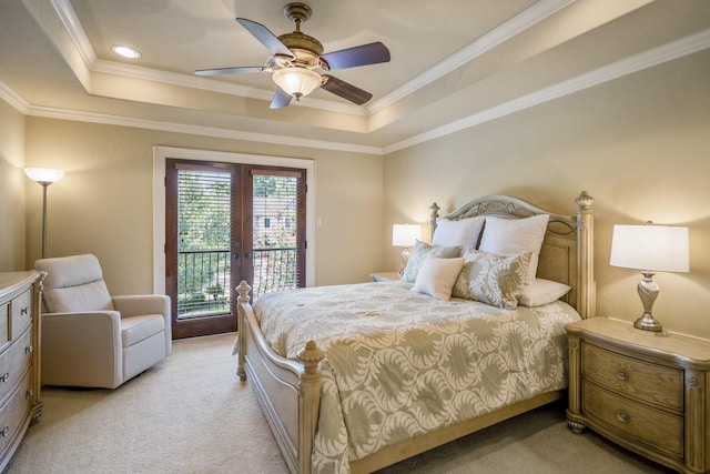 102 Lake Sterling Gate Dr, Spring, TX 77379 - bedroom with light carpet, french doors, access to outside, a tray ceiling, and crown molding