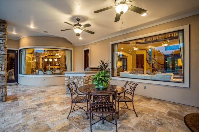 102 Lake Sterling Gate Dr, Spring, TX 77379 - dining area featuring stone tile floors and ceiling fan