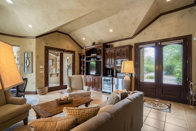 102 Lake Sterling Gate Dr, Spring, TX 77379 - living area featuring wine cooler, lofted ceiling, french doors, light tile patterned flooring, and recessed lighting