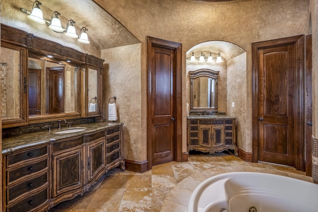 102 Lake Sterling Gate Dr, Spring, TX 77379 - full bath with two vanities and a whirlpool tub