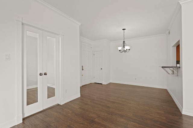 5200 Weslayan St Unit 101, Houston, TX 77005 - unfurnished dining area featuring a chandelier, dark wood-style floors, and crown molding