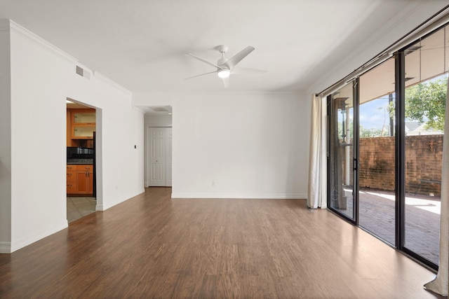 5200 Weslayan St Unit 101, Houston, TX 77005 - spare room with wood finished floors, ceiling fan, and crown molding