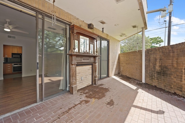 5200 Weslayan St Unit 101, Houston, TX 77005 - view of patio featuring a ceiling fan
