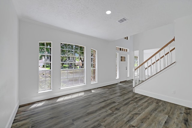 1826 Cheyenne River Cir, Sugar Land, TX 77478 - foyer entrance featuring a textured ceiling, stairs, wood finished floors, and recessed lighting