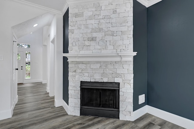 1826 Cheyenne River Cir, Sugar Land, TX 77478 - detailed view of crown molding, a fireplace, and wood finished floors