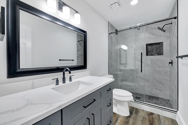 1826 Cheyenne River Cir, Sugar Land, TX 77478 - full bathroom featuring vanity, wood finished floors, and a shower stall