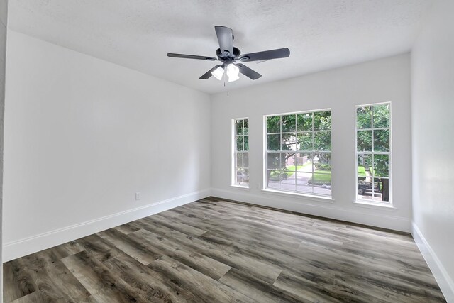 1826 Cheyenne River Cir, Sugar Land, TX 77478 - unfurnished room with dark wood finished floors and a ceiling fan
