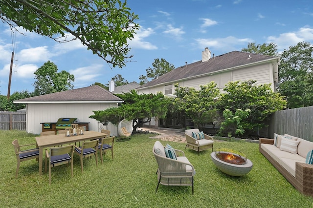 1826 Cheyenne River Cir, Sugar Land, TX 77478 - fenced backyard featuring an outdoor living space with a fire pit and outdoor dining space