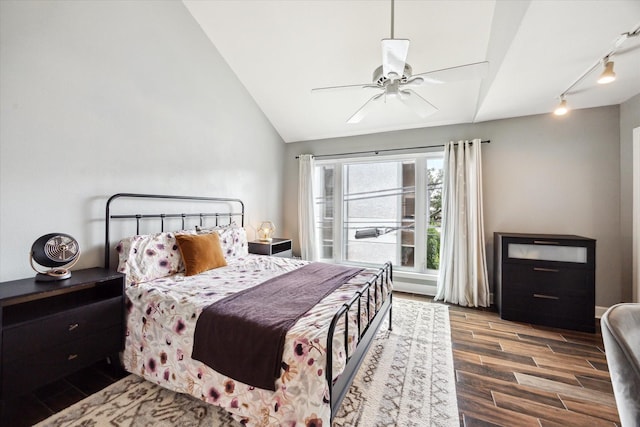 4914 Feagan St, Houston, TX 77007 - bedroom featuring wood finished floors, track lighting, lofted ceiling, and ceiling fan