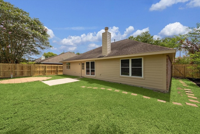 1034 S Wellsford Dr, Pearland, TX 77584 - back of house featuring a chimney, a fenced backyard, a patio area, and roof with shingles