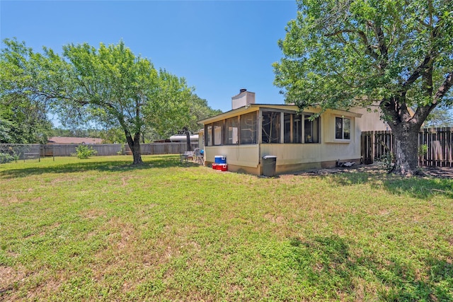 600 Erin Cir, Leander, TX 78641 - fenced backyard with a sunroom