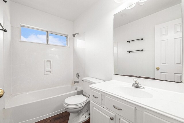 3242 Enchanted Hollow Ln, Spring, TX 77388 - bathroom with tub / shower combination, vanity, and wood finished floors
