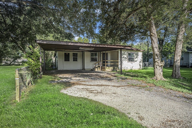 4028 N 1/2 Ave, Santa Fe, TX 77510 - view of front of home featuring driveway and a front lawn