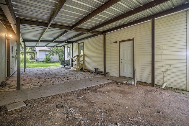 4028 N 1/2 Ave, Santa Fe, TX 77510 - garage featuring an attached carport