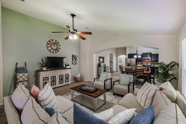 2010 Wembley Way, Rosenberg, TX 77471 - living room with arched walkways, ceiling fan, vaulted ceiling, and carpet