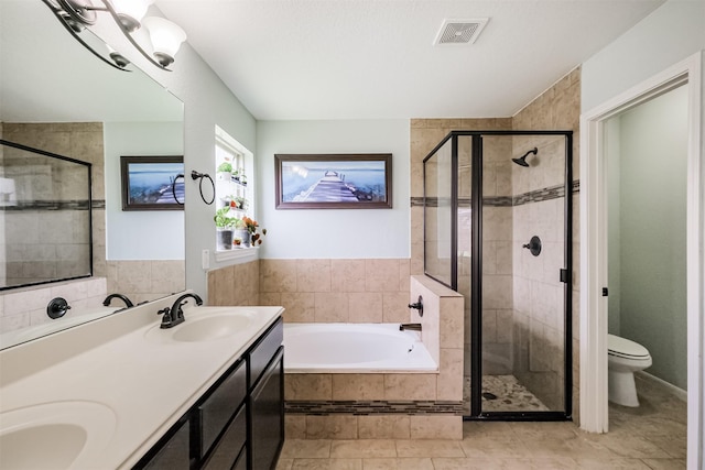 2010 Wembley Way, Rosenberg, TX 77471 - bathroom with a stall shower, a garden tub, double vanity, and tile patterned flooring