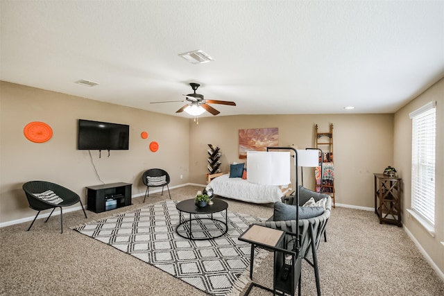 2010 Wembley Way, Rosenberg, TX 77471 - living room featuring healthy amount of natural light, carpet flooring, and ceiling fan
