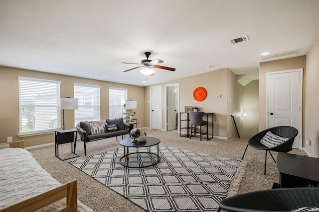 2010 Wembley Way, Rosenberg, TX 77471 - carpeted living area with healthy amount of natural light and ceiling fan