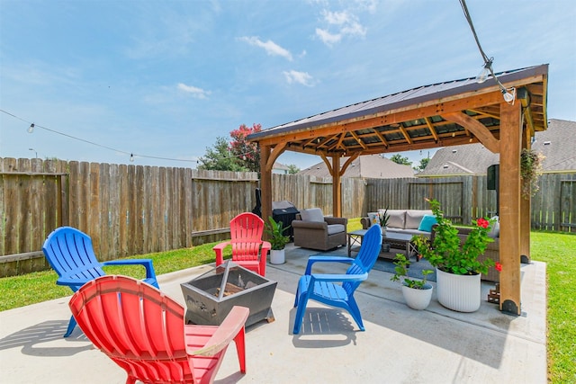 2010 Wembley Way, Rosenberg, TX 77471 - fenced backyard featuring a gazebo, an outdoor living space with a fire pit, a patio, and a grill
