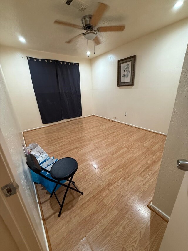 7431 Water Park Ln, Houston, TX 77086 - unfurnished room with wood finished floors and ceiling fan