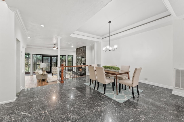 12013 Naughton St, Houston, TX 77024 - dining area featuring recessed lighting, marble tiled floors, decorative columns, ornamental molding, and a chandelier