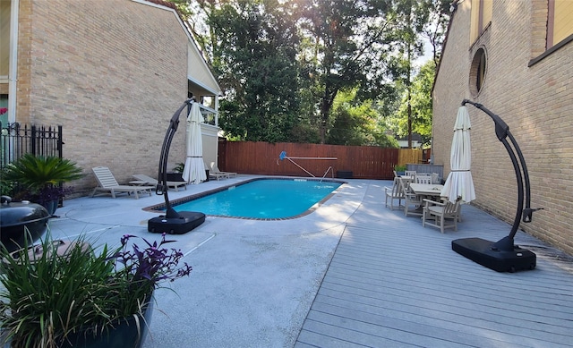 12013 Naughton St, Houston, TX 77024 - view of pool with a fenced backyard, outdoor dining space, and a patio area