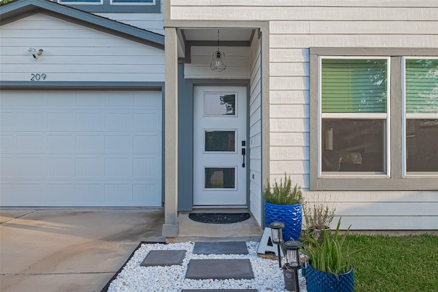 209 Blueberry St, Houston, TX 77018 - doorway to property with a garage