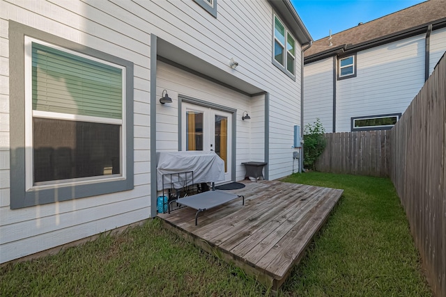 209 Blueberry St, Houston, TX 77018 - fenced backyard featuring a wooden deck and french doors