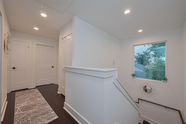 209 Blueberry St, Houston, TX 77018 - corridor featuring an upstairs landing, recessed lighting, and dark wood-style flooring
