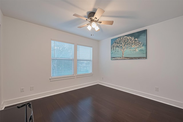 209 Blueberry St, Houston, TX 77018 - empty room featuring a ceiling fan and dark wood-style floors