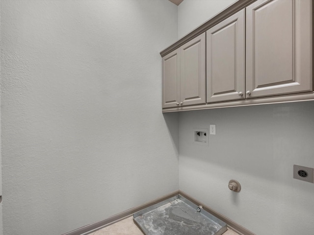 211 Cheswood Forest Pl, Montgomery, TX 77316 - laundry room with cabinet space, hookup for an electric dryer, hookup for a washing machine, and hookup for a gas dryer