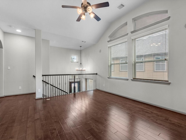 211 Cheswood Forest Pl, Montgomery, TX 77316 - unfurnished room featuring a ceiling fan, hardwood / wood-style floors, lofted ceiling, and a chandelier