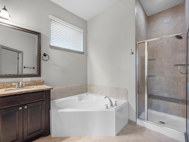 211 Cheswood Forest Pl, Montgomery, TX 77316 - bathroom featuring a bath, vanity, a stall shower, and tile patterned flooring