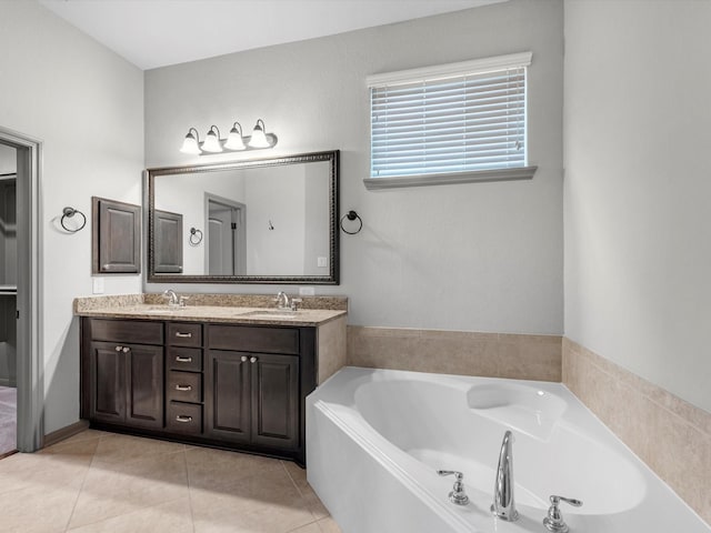 211 Cheswood Forest Pl, Montgomery, TX 77316 - bathroom with a garden tub, double vanity, and tile patterned flooring