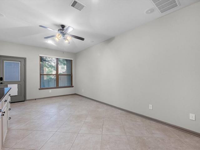 211 Cheswood Forest Pl, Montgomery, TX 77316 - unfurnished room with a ceiling fan and light tile patterned flooring