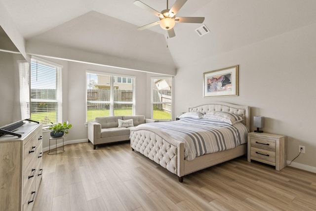 503 Highland Thicket Dr, Conroe, TX 77316 - bedroom with light wood-style flooring, lofted ceiling, and a ceiling fan