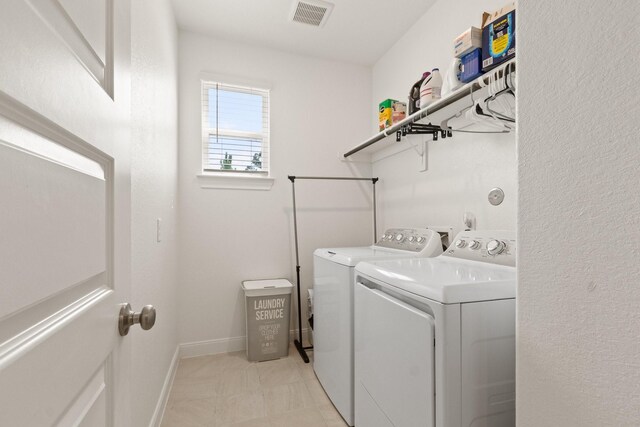 503 Highland Thicket Dr, Conroe, TX 77316 - washroom with separate washer and dryer and baseboards