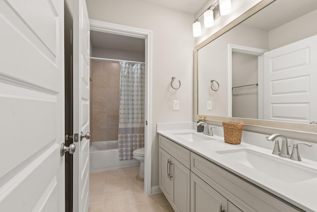 503 Highland Thicket Dr, Conroe, TX 77316 - full bathroom featuring double vanity, tile patterned floors, and shower / bath combination with curtain